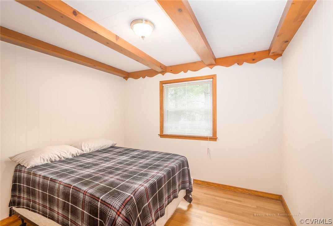 2307 Cranbrook Road Henrico, VA 23229 - Photo 13 of 18 a bedroom with a bed and a window