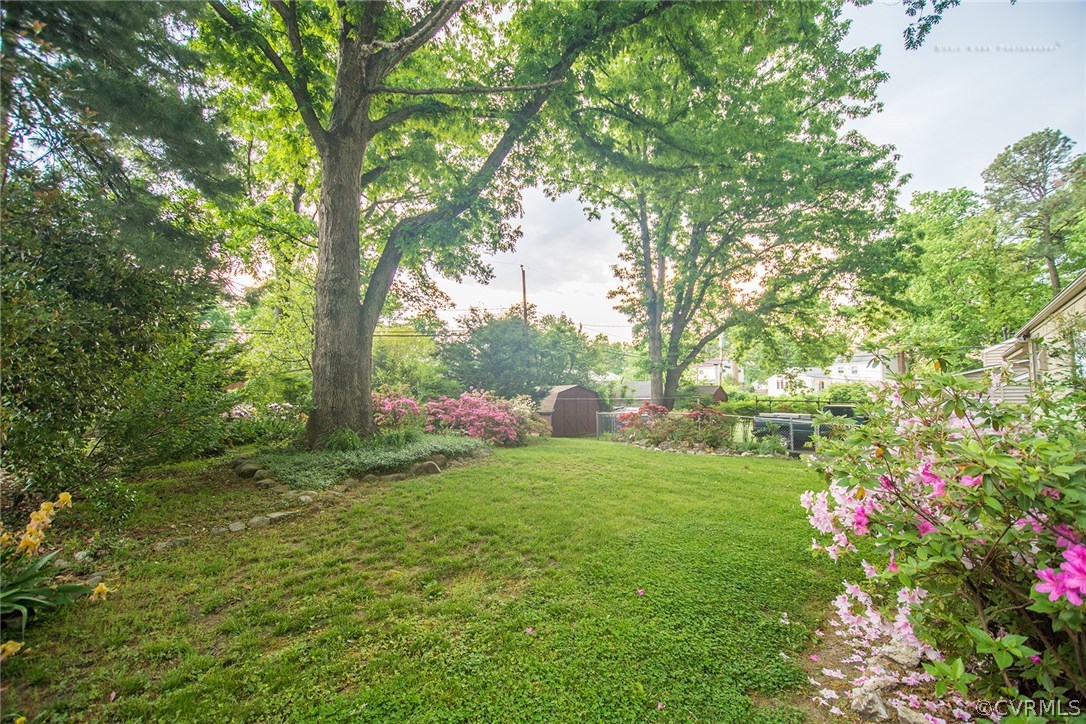 2307 Cranbrook Road Henrico, VA 23229 - Photo 18 of 18 a green field with lots of flowers in it