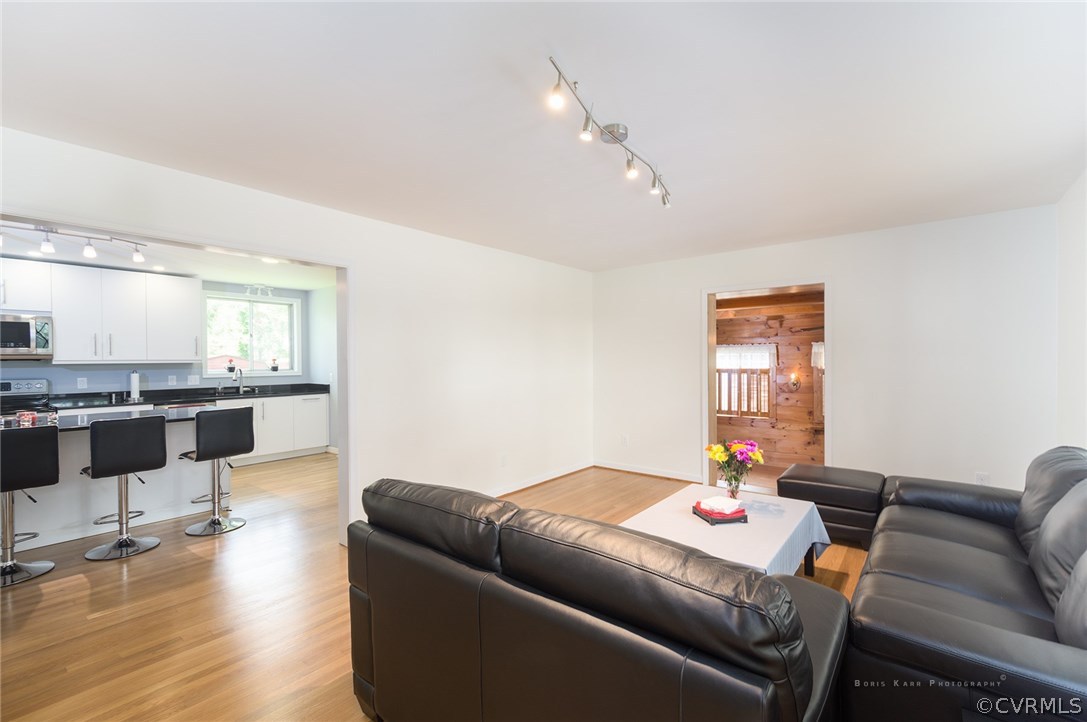 2307 Cranbrook Road Henrico, VA 23229 - Photo 7 of 18 a living room with furniture and wooden floor