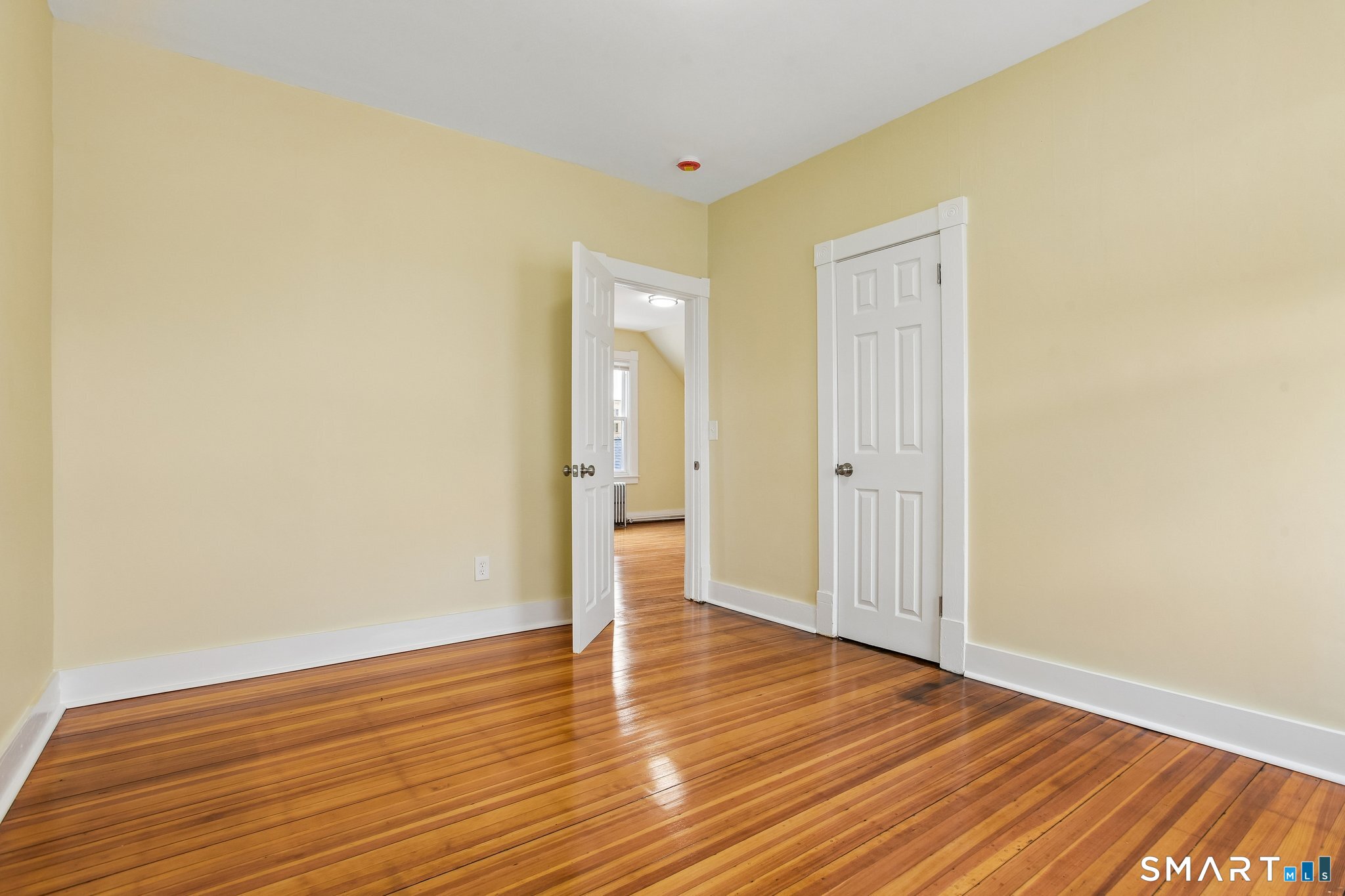 39 Grand Street, Unit 3 Middletown, CT 06457 - Photo 16 of 21 a view of a room with wooden floor