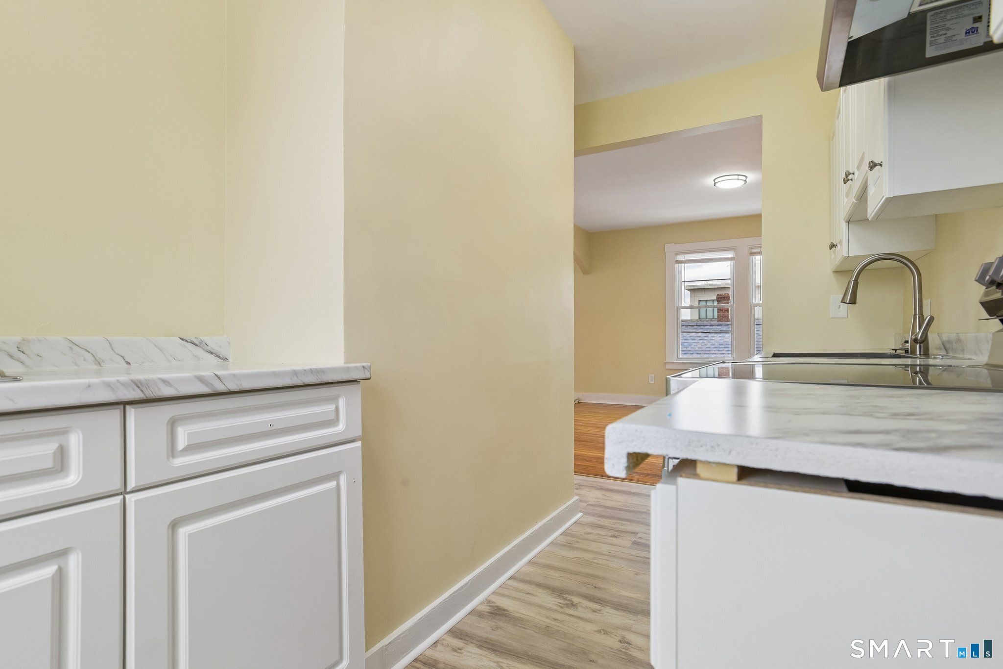 39 Grand Street, Unit 3 Middletown, CT 06457 - Photo 10 of 21 a bathroom with a sink and a mirror
