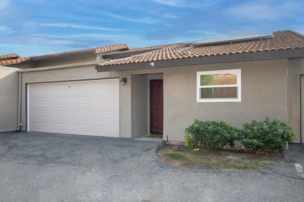 a view of a house with a garage