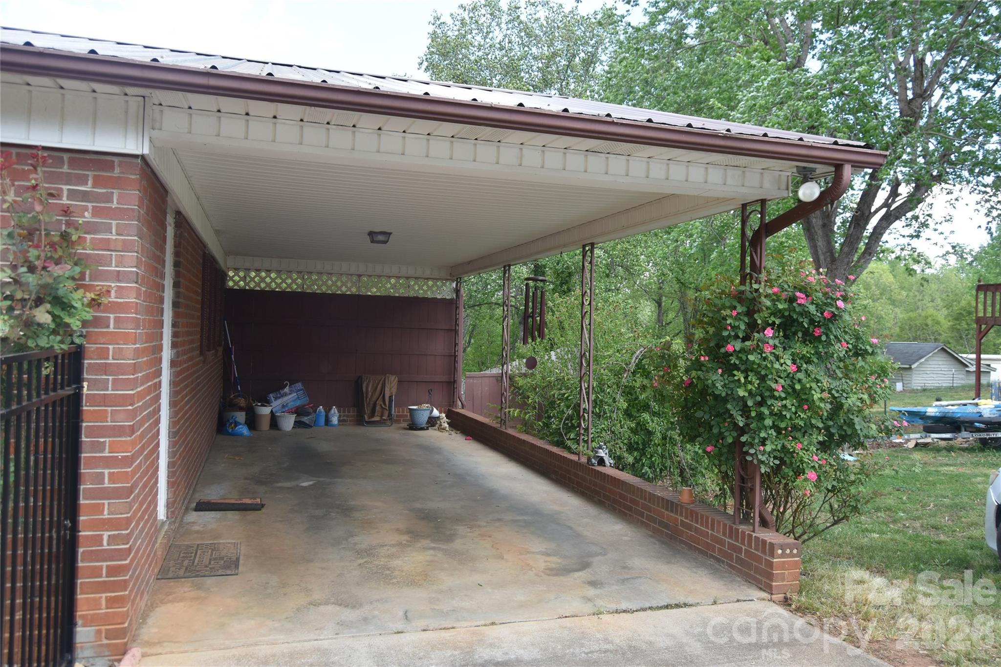 1082 Maple Street Granite Falls, NC 28630 - Photo 2 of 25 a view of a two chairs in the patio
