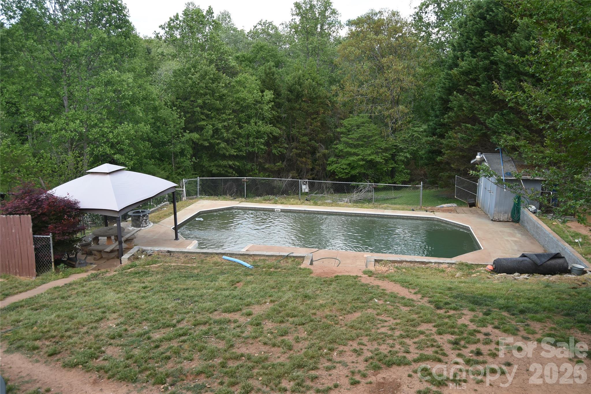 1082 Maple Street Granite Falls, NC 28630 - Photo 24 of 25 a view of a swimming pool and lounge chairs