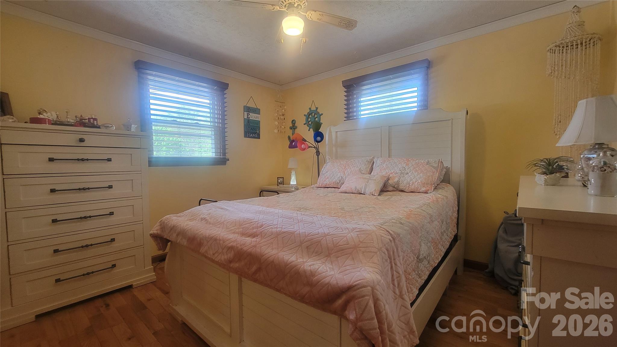 1082 Maple Street Granite Falls, NC 28630 - Photo 10 of 25 a bedroom with a bed and a dresser
