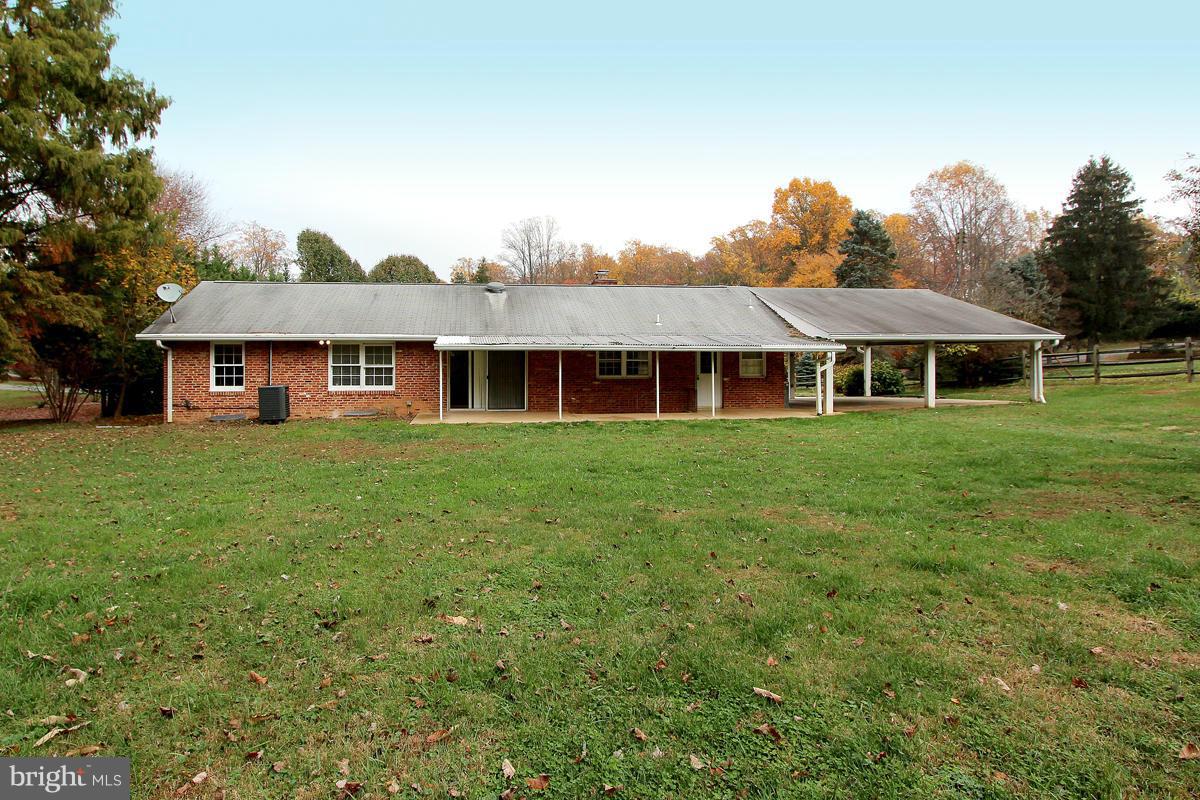 17216 Donora Road Silver Spring, MD 20905 - Photo 28 of 28 a front view of a house with a yard