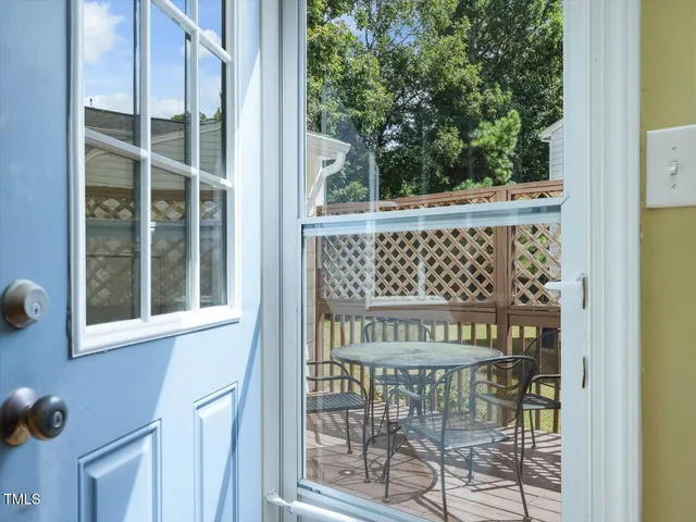 a view of a balcony with chairs