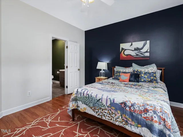 a bathroom with a toilet and a bathtub