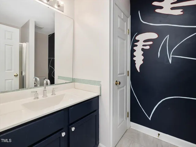 a living room with furniture and a gate