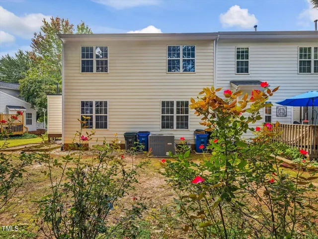 a sign broad on a brick wall