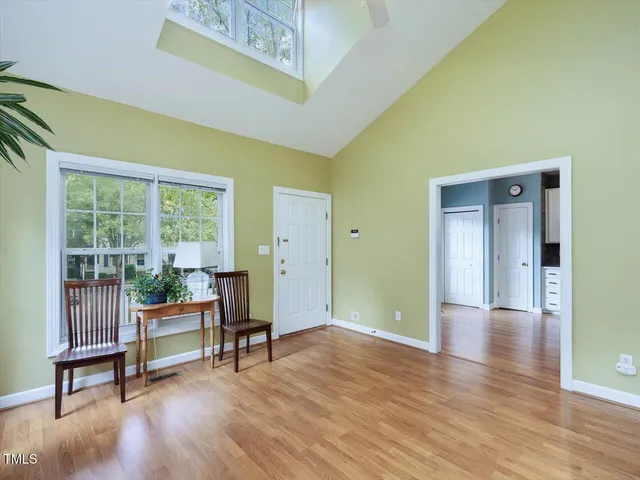 a sign on a wall next to a road