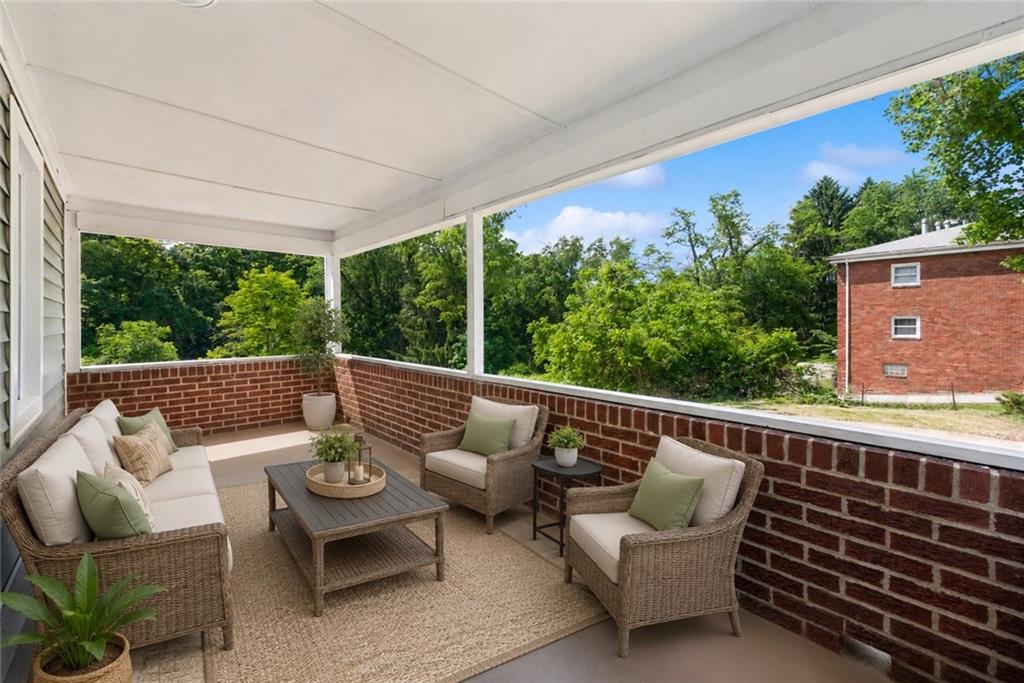 690 Brownstown Road Irwin, PA 15642 - Photo 2 of 26 Large covered patio *virtually staged*