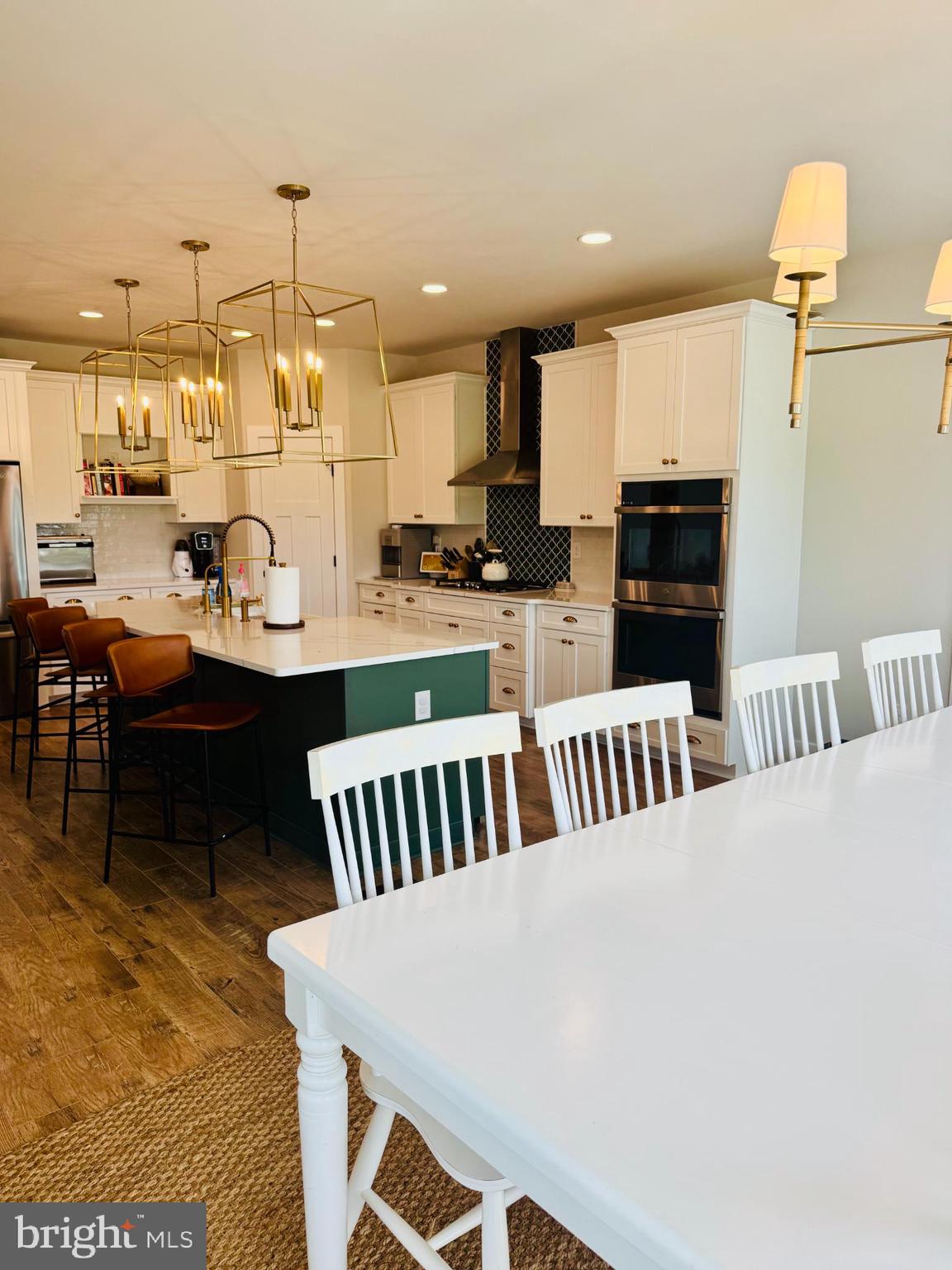 22464 Hummingbird Road Ellendale, DE 19941 - Photo 3 of 28 Modern kitchen with elegant lighting.