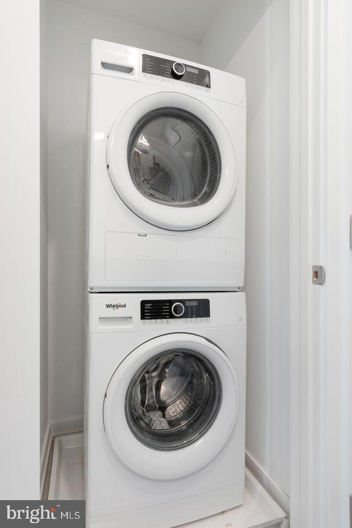 1141 North Front Street, Unit 307 Philadelphia, PA 19123 - Photo 17 of 28 a utility room with dryer and washer
