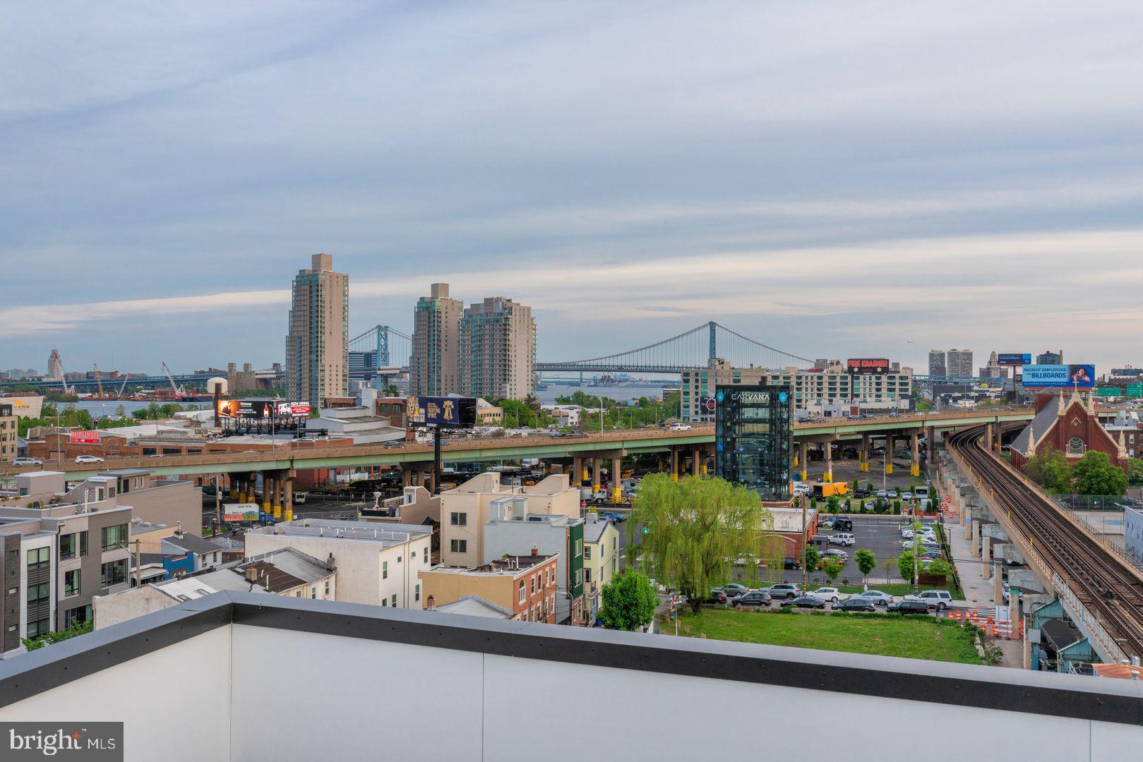 1141 North Front Street, Unit 307 Philadelphia, PA 19123 - Photo 23 of 28 a city view with tall buildings