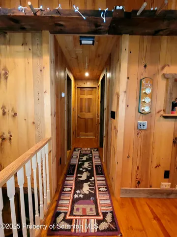 a bathroom with a double vanity sink a toilet and a mirror