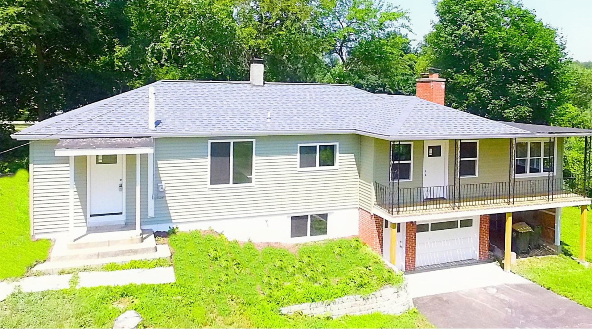 11 Vale Road West Chicago, IL 60185 - Photo 1 of 15 a front view of a house with a yard