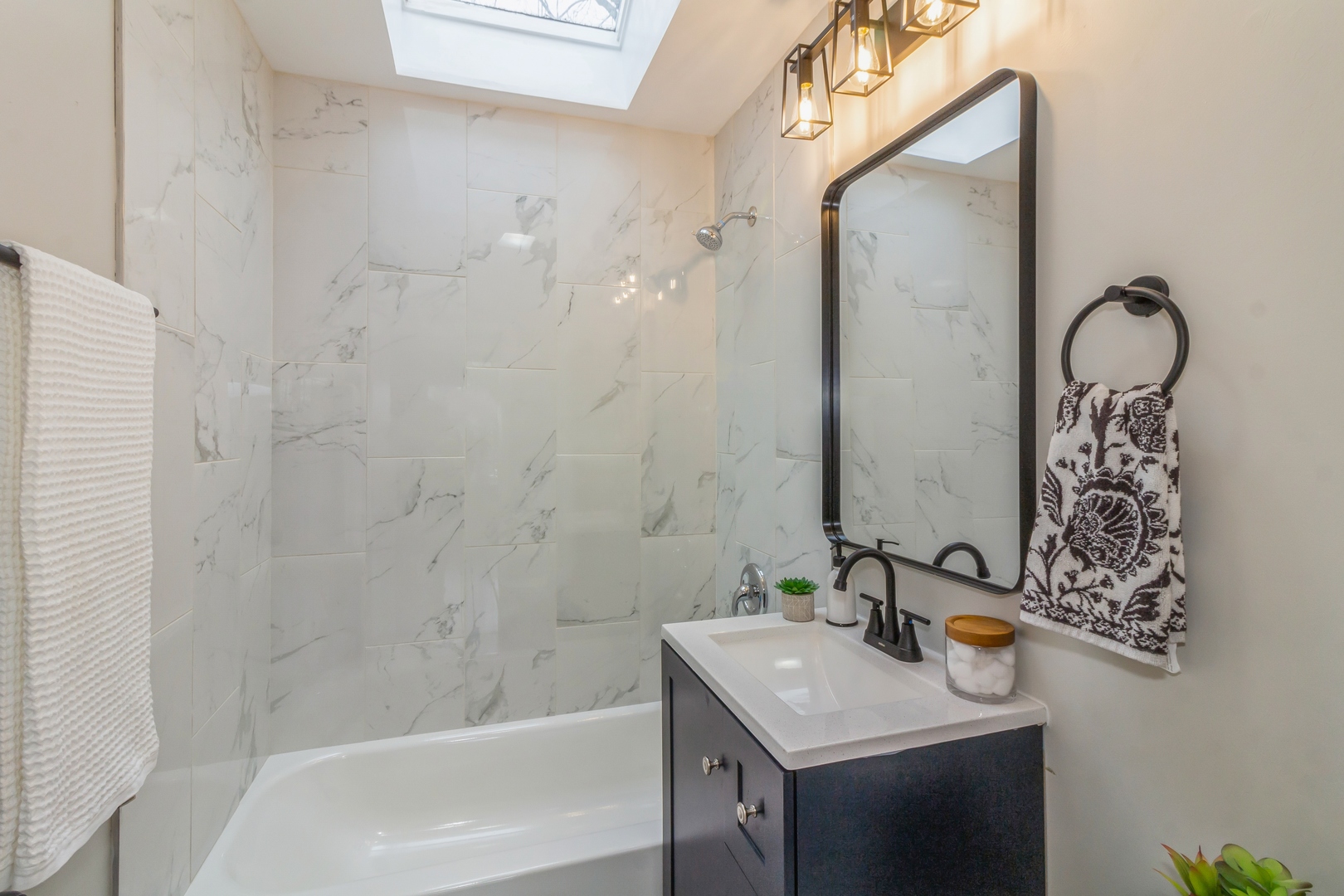 11 Vale Road West Chicago, IL 60185 - Photo 6 of 15 a bathroom with a sink and a mirror