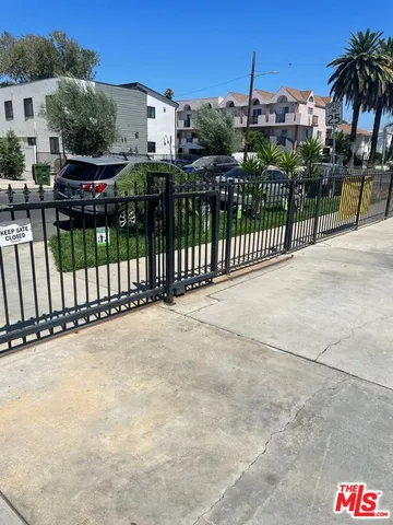 a view of street from balcony