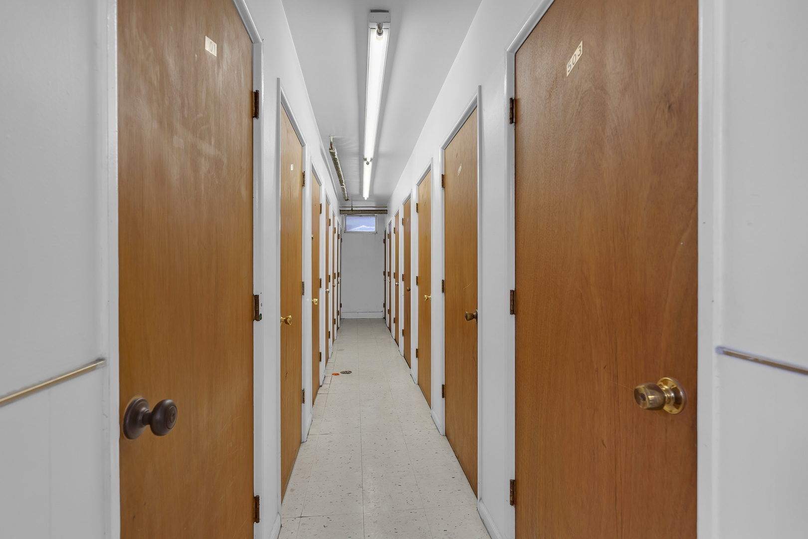 4976 North Milwaukee Avenue, Unit 401 Chicago, IL 60630 - Photo 19 of 23 a view of a hallway with a door