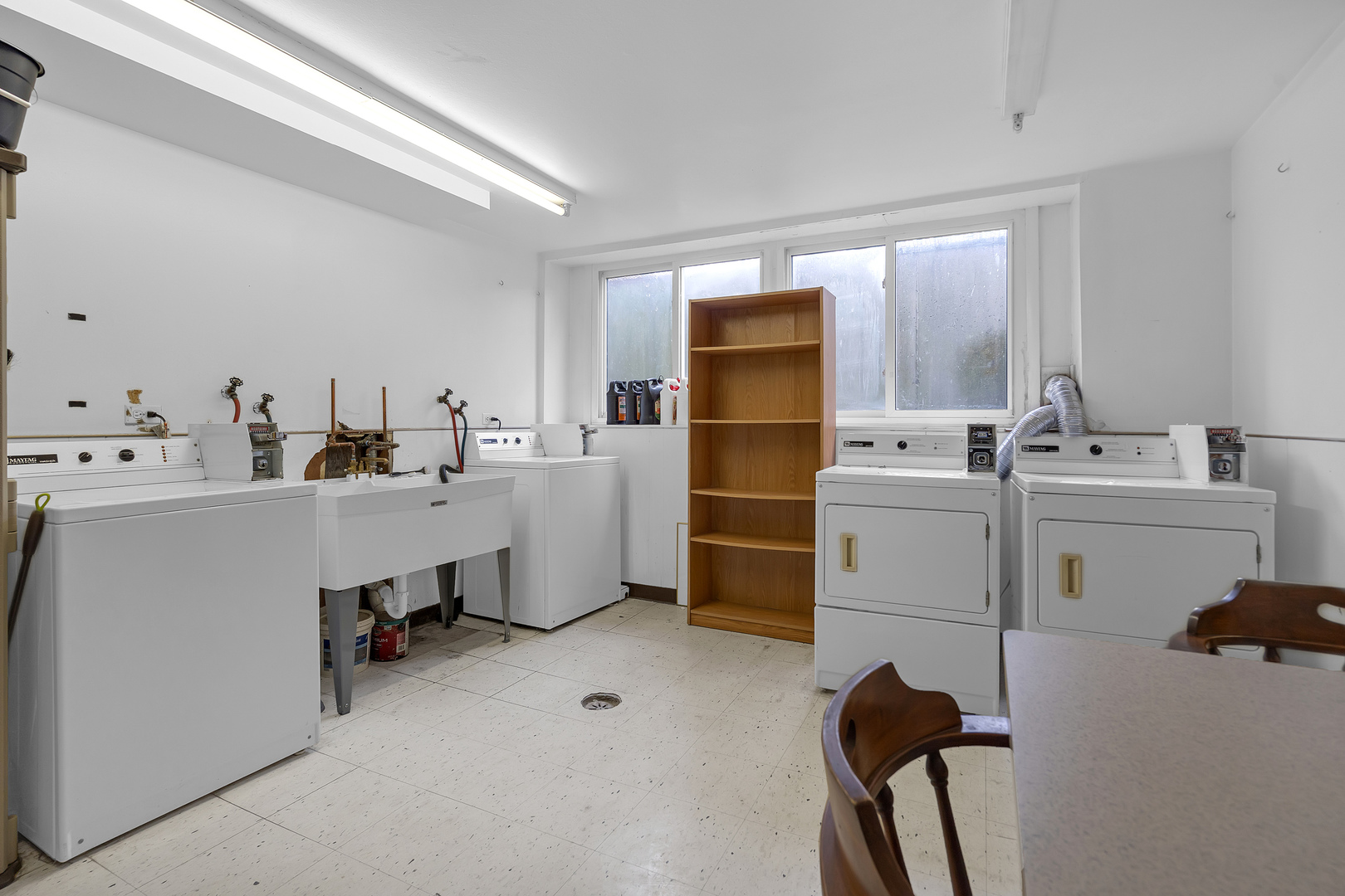 4976 North Milwaukee Avenue, Unit 401 Chicago, IL 60630 - Photo 20 of 23 a room with storage and utility