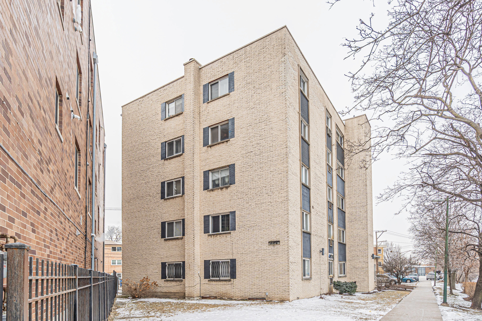 4976 North Milwaukee Avenue, Unit 401 Chicago, IL 60630 - Photo 22 of 23 a front view of a building