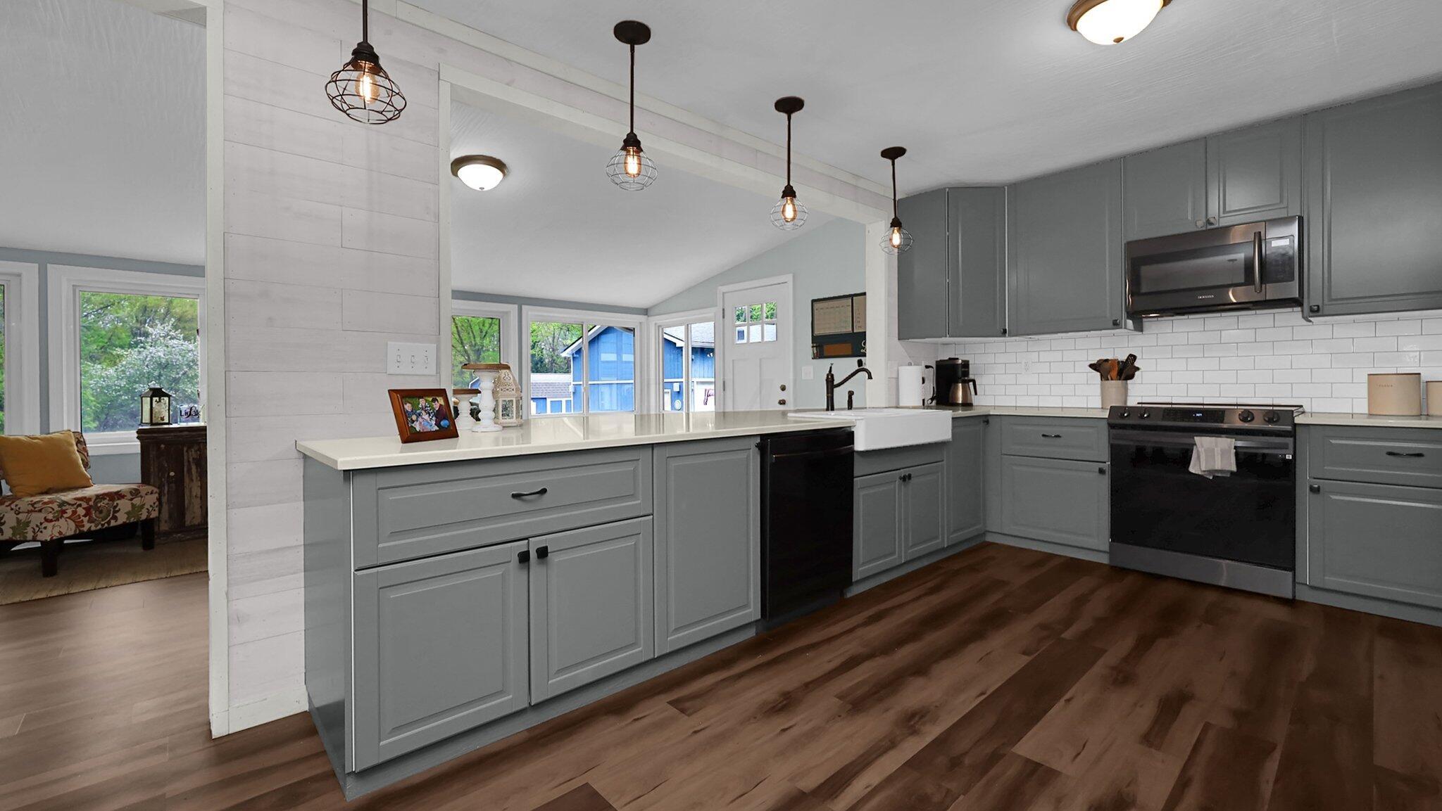 7790 Schott Road Westerville, OH 43081 - Photo 10 of 50 Custom peninsula allows even more room for friends to engage with the cook!
