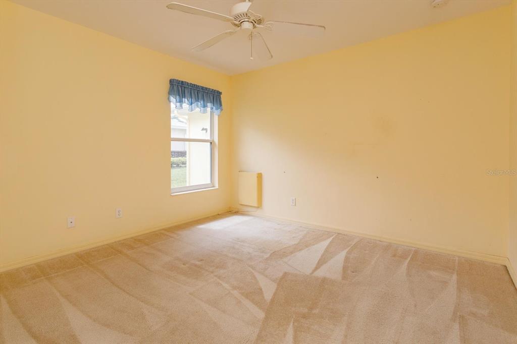 5151 Indian Ocean Loop Tavares, FL 32778 - Photo 22 of 28 a view of empty room with window