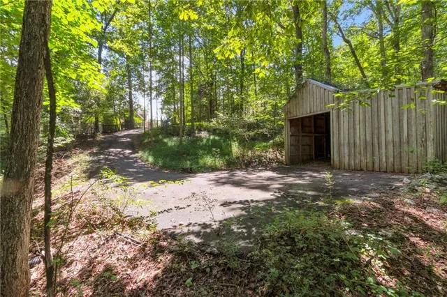 a backyard of a house with lots of green space