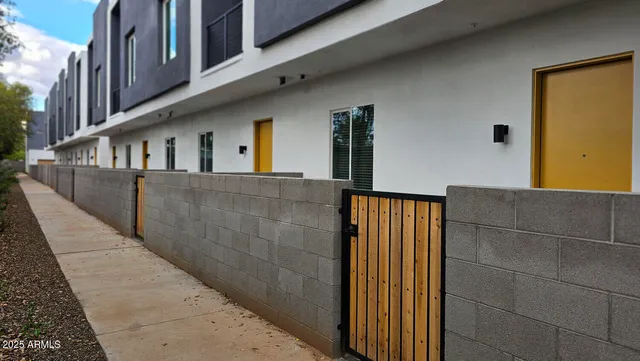 a view of balcony with furniture