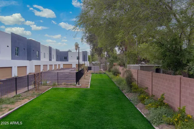 a view of a house with a back yard