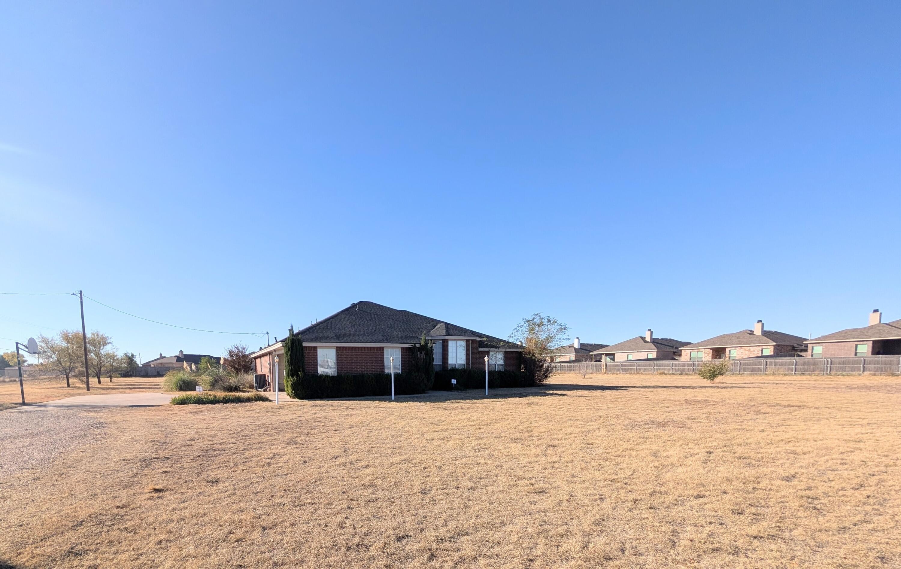 8909 19th Street Lubbock, TX 79407 - Photo 13 of 13 a view of a lake