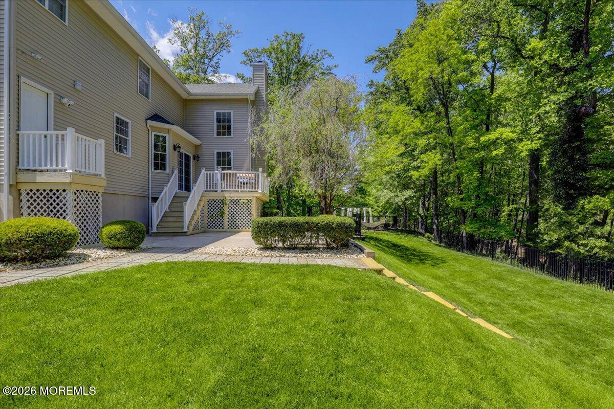 7 Highpoint Road Holmdel, NJ 07733 - Photo 57 of 61 Backyard with stairs to lower area