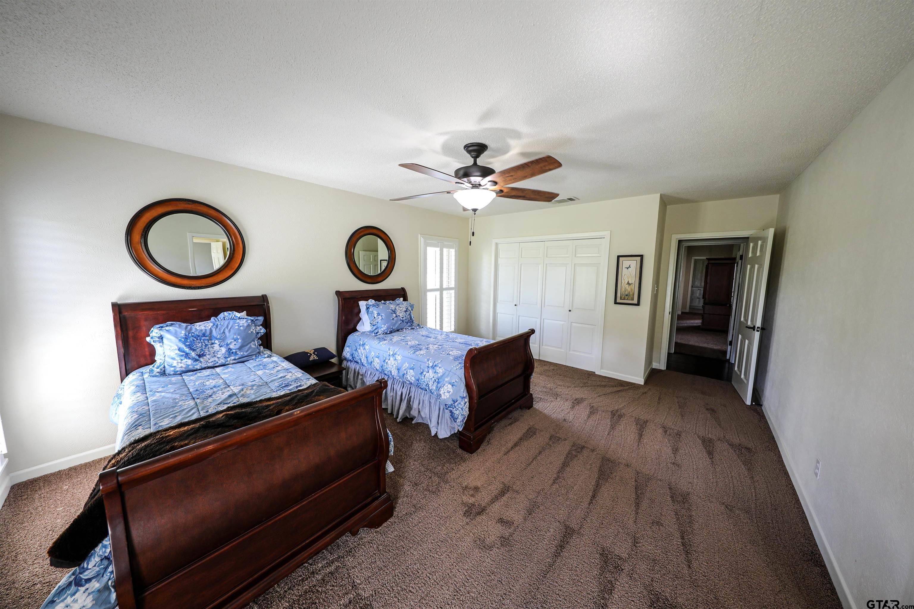 2125 Highway 11 Pittsburg, TX 75686 - Photo 13 of 27 a living room with furniture and a wooden floor