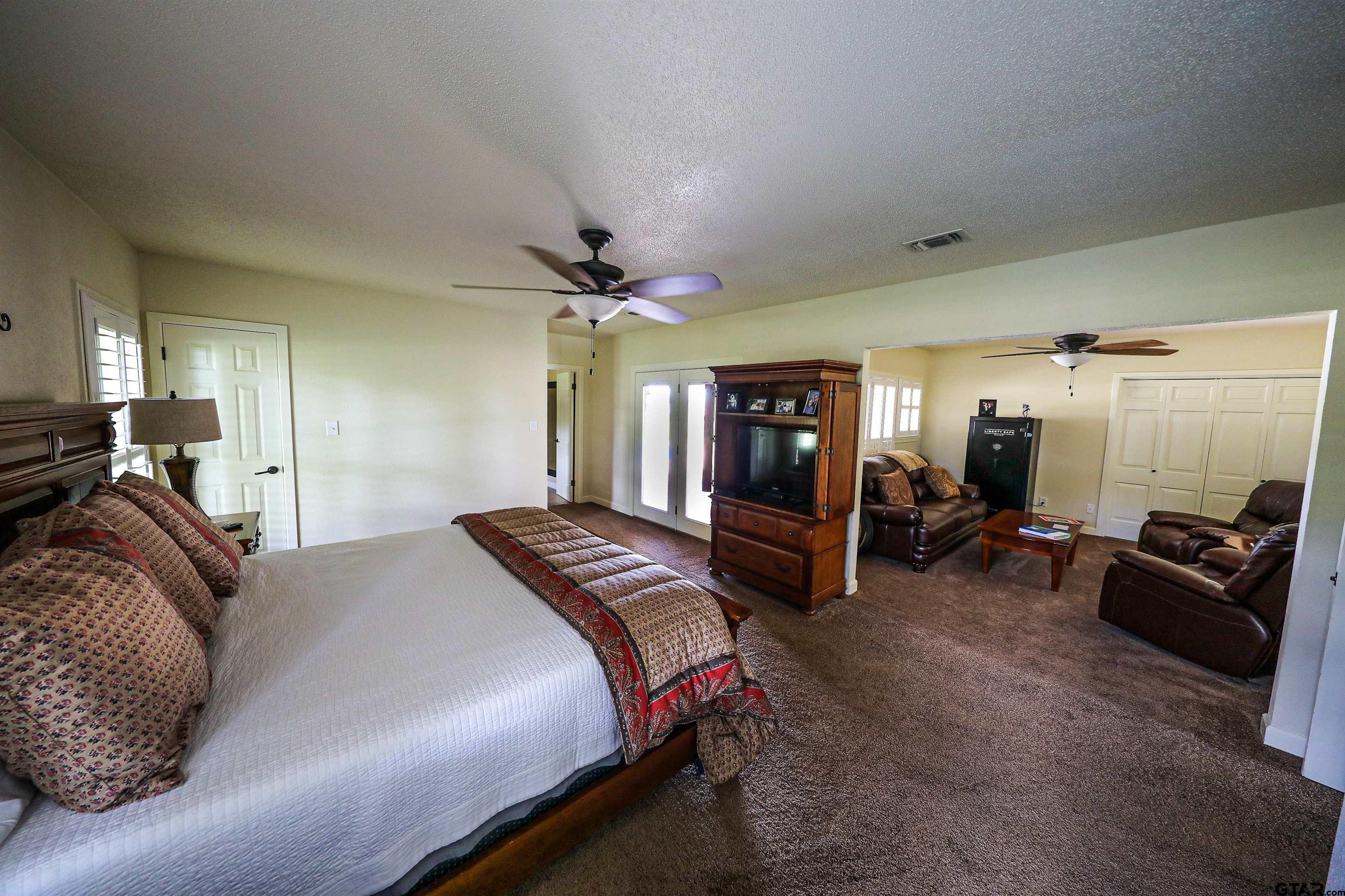 2125 Highway 11 Pittsburg, TX 75686 - Photo 14 of 27 a bed room with a bed and furniture
