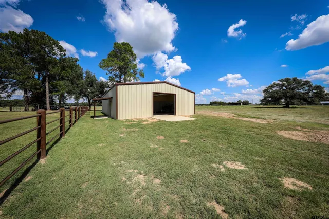 a house view with a garden space