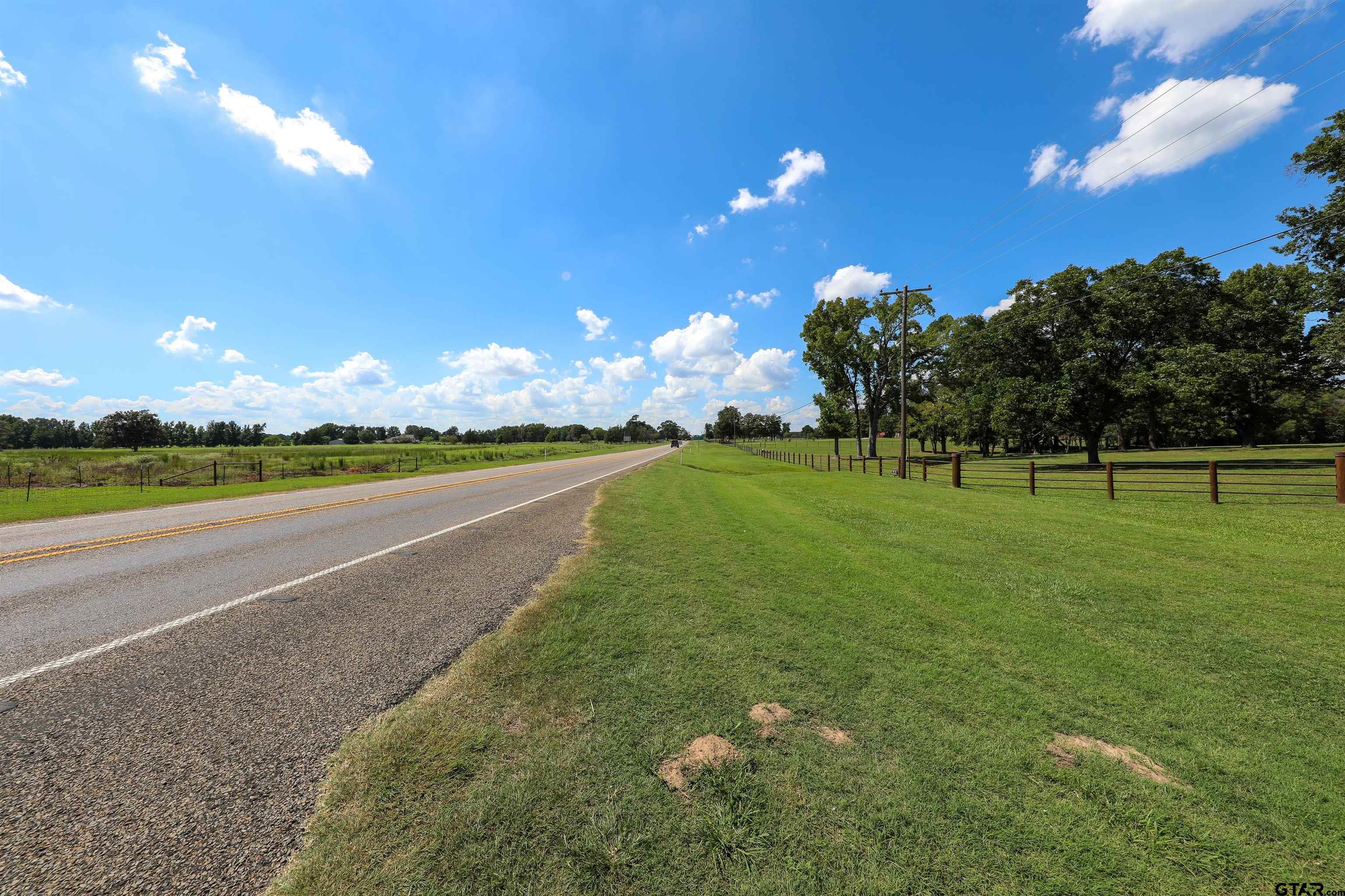 2125 Highway 11 Pittsburg, TX 75686 - Photo 26 of 27 a view of a golf course with a lake