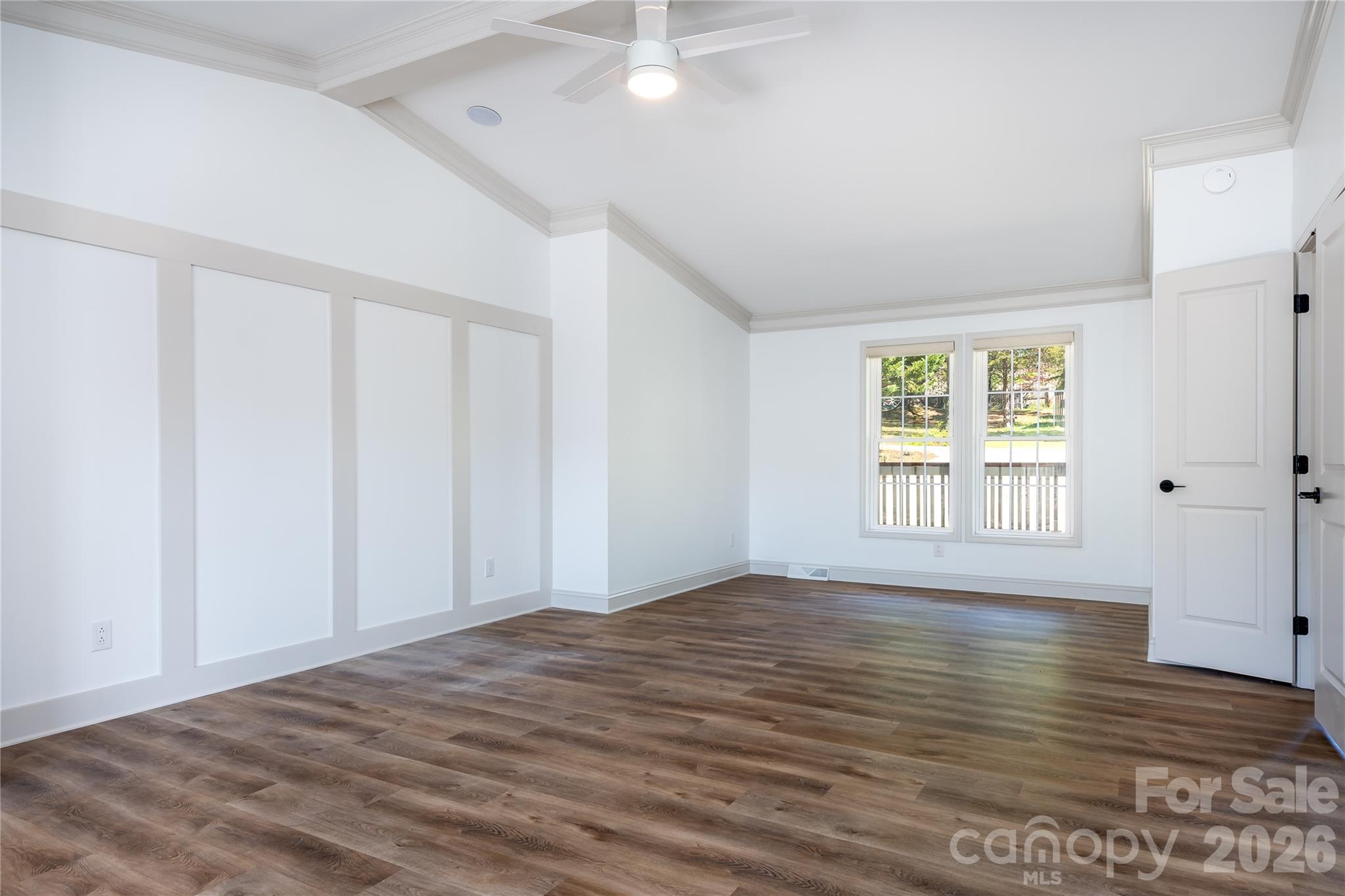 7858 Blackwood Road Denver, NC 28037 - Photo 7 of 11 wooden floor in an empty room with a window