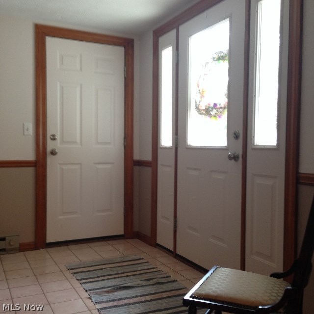 112 Laurel Road Chagrin Falls, OH 44022 - Photo 7 of 23 Large front entry with large coat closet, entry to two car attached garage, and nice size half bath.