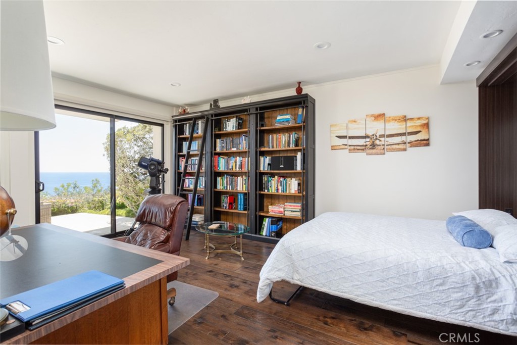 1401 Emerald Bay Laguna Beach, CA 92651 - Photo 18 of 28 a bedroom with furniture and a large window