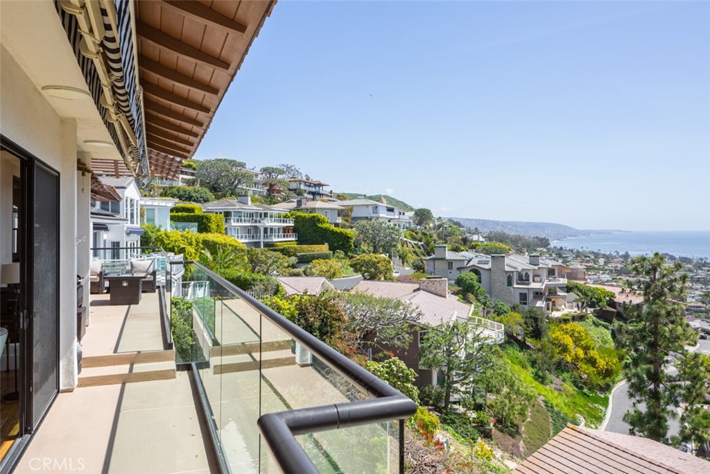 1401 Emerald Bay Laguna Beach, CA 92651 - Photo 7 of 28 a view of a balcony with furniture