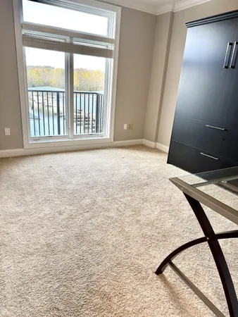 a view of empty room with a window