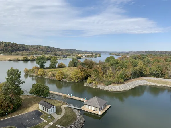 an aerial view of a house with a lake view