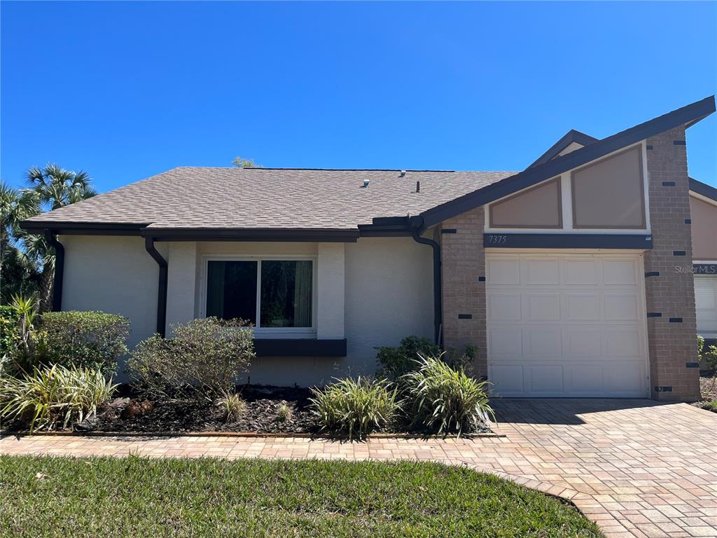 Restricted Address Weeki Wachee, FL 34613 - Photo 1 of 49 a front view of a house with a yard