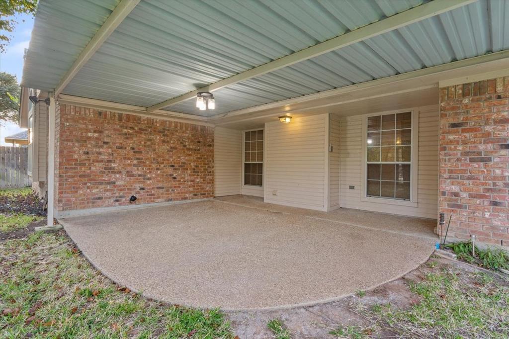 10700 Apache Drive Waco, TX 76712 - Photo 13 of 15 front view of a house with a garage