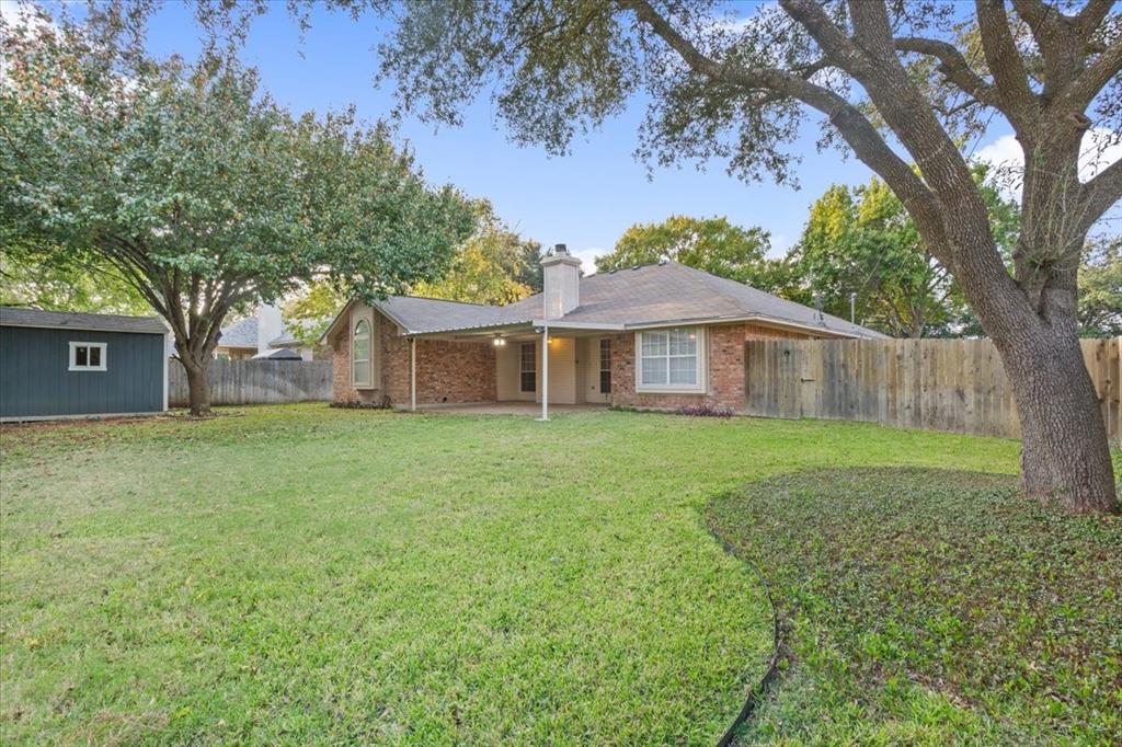 10700 Apache Drive Waco, TX 76712 - Photo 2 of 15 a view of house with a garden