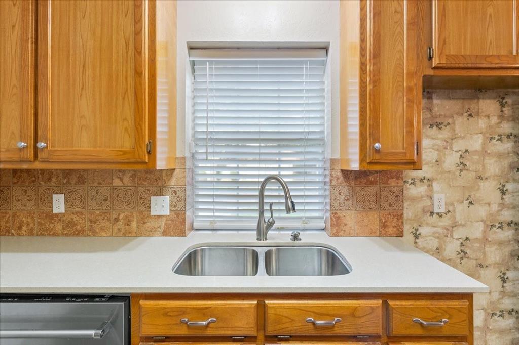 10700 Apache Drive Waco, TX 76712 - Photo 6 of 15 a kitchen with sink and cabinets