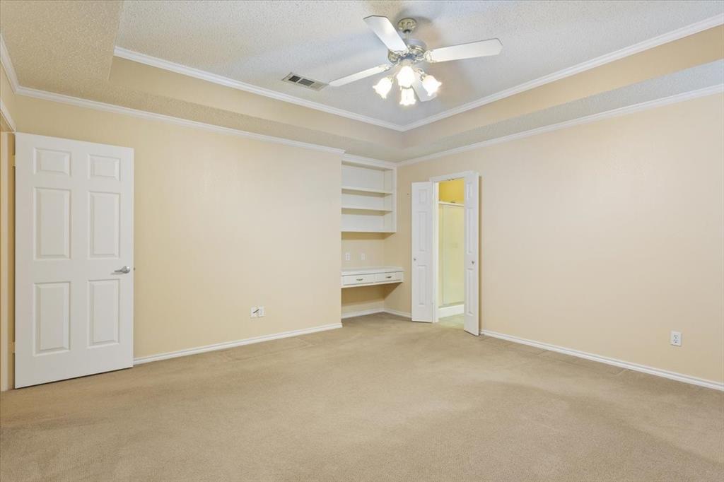 10700 Apache Drive Waco, TX 76712 - Photo 8 of 15 an empty room with a ceiling fan and a window