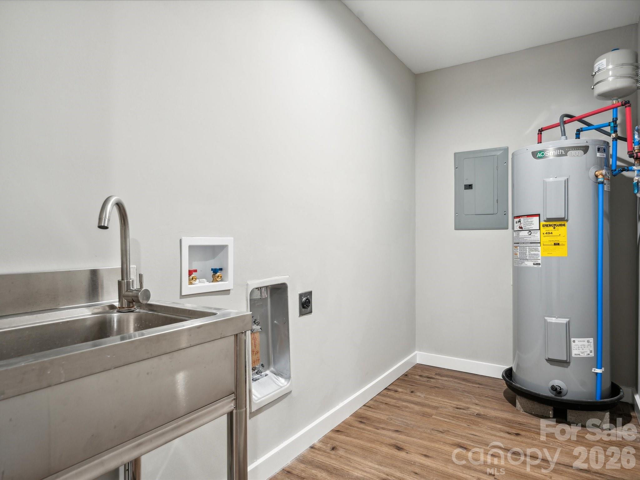 2000 Tyvola Road Charlotte, NC 28210 - Photo 20 of 32 a kitchen with a sink and a stove top oven