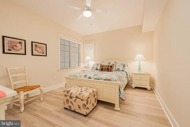 a bedroom with a bed and a chair